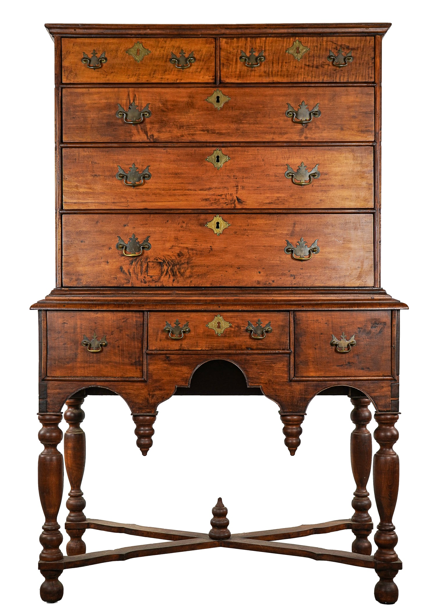 William & Mary Tiger Maple Highboy: William & Mary tiger maple two part highboy. Upper case with 2 over 3 drawers, lower case with 3 drawers, turned legs, cross stretcher base. Chippendale style hardware. 39" wide x 63"h. Made of variou