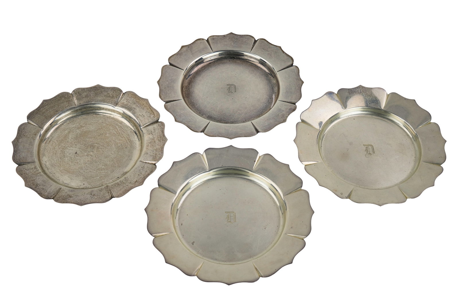 4 Elgin Silversmiths Sterling Bread Plates: Set of 4 ca. 1920 Elgin Silversmiths sterling silver scalloped bread and butter plates having Gothic script "D" monogram in center dia. 6.5" 15 troy oz.