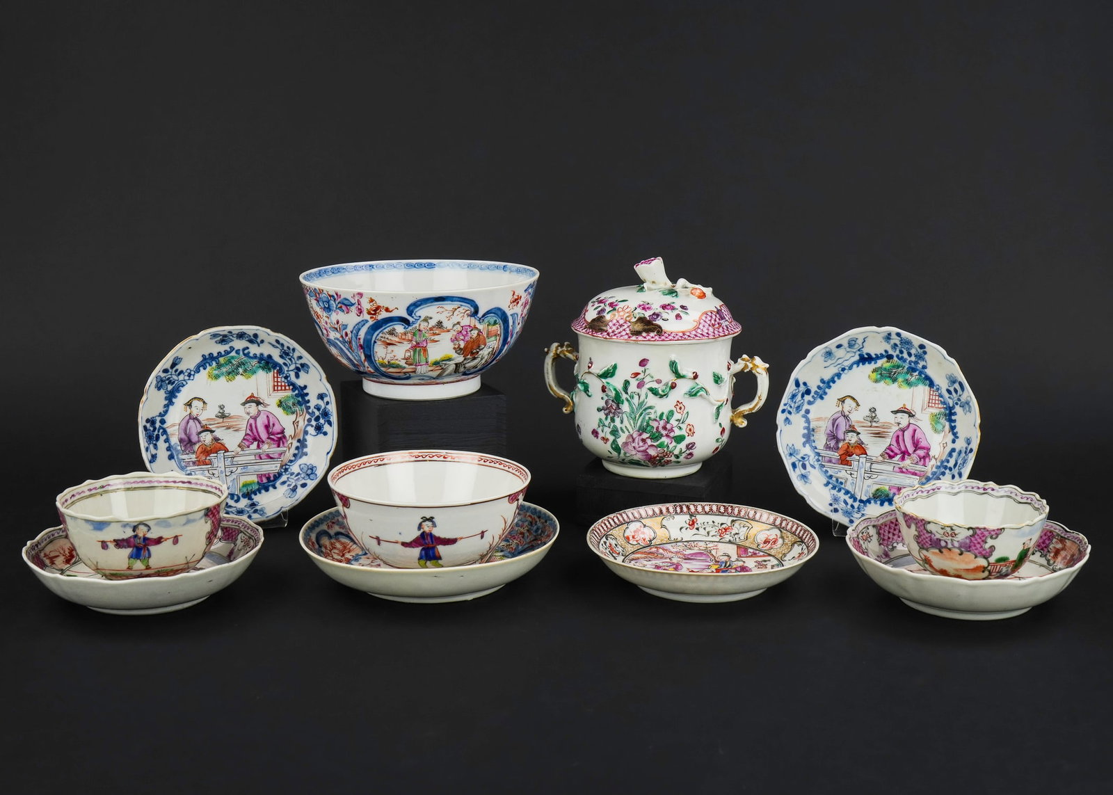 11 pcs. Chinese Export Scenic Decorated Porcelain: 11 pcs. 18th c. Chinese Export porcelain tableware including double handled covered pot with raised floral and raspberry "fishnet" decoration, two figural acrobat decorated dishes, pair of dishes with