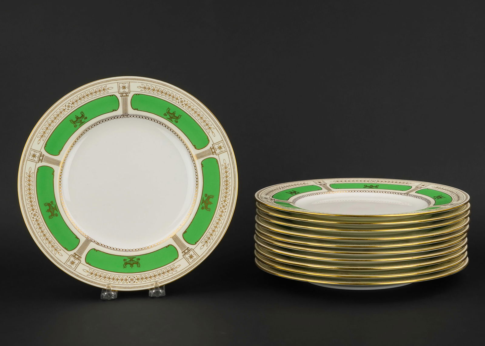 11 Minton "Corinth" Porcelain Dinner Plates: Set of 11 ca. 1920 Minton "Corinth" pattern having spring green and raised gilt enamel neoclassical decorated borders including fluted columns, urns, rosettes, and laurels, retailed by the Bailey, Ban