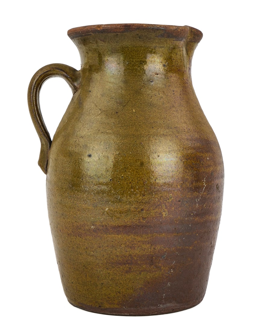 Early 19th c Stoneware Batter Pitcher: Early 19th c New England ovoid form stoneware batter pitcher, unusual glaze, minor flake on base from manufacture, ht 10 3/4"