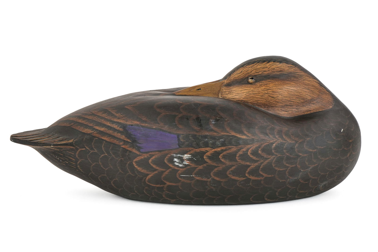 Glenn Cooke Sleeping Black Duck Decoy: Glenn Cooke (1932-2023 Manasquan, New Jersey) sleeping drake black duck decoy, signed on base and inscribed "carved for Doctor John Motley 1992", good condition, length 14"