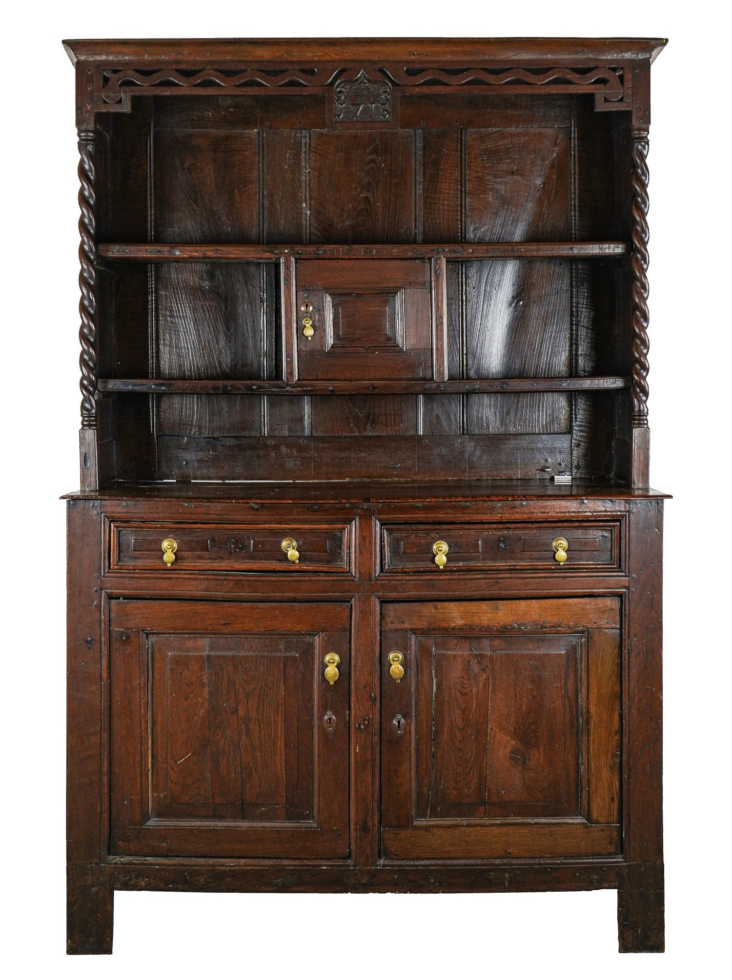 1715 English Oak Step Back Cupboard: 1715 English two part oak step back cupboard with base having bracket base, double doors, and 2 drawers. Upper section with barrel twist columns, double plate rail shelves with center lock compartment