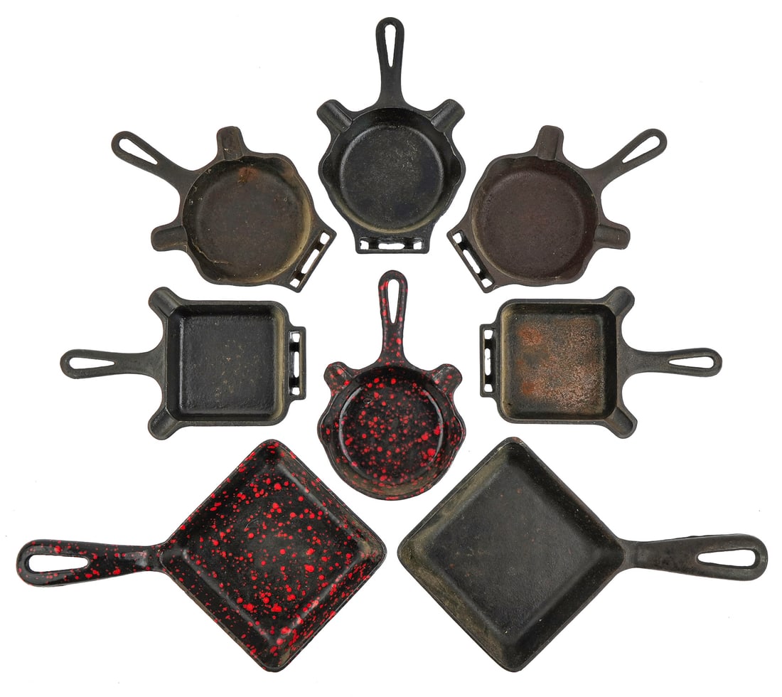 Griswold Cast Iron Ashtrays/ Skillets: Griswold cast iron ashtrays/ toy skillets (25 pcs), including red speckled enamel 129A square egg skillet, another 129A square egg skillet, multiple 570's, 770's, two No.0's, etc