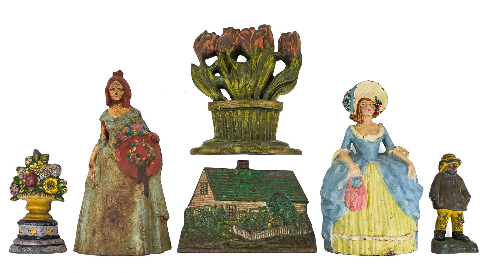 Cast Iron Lady Doorstops, other Doorstops: Cast Iron Lady doorstops, other doorstops (6 pcs), lengths/ hts from 6" to 11 1/2"