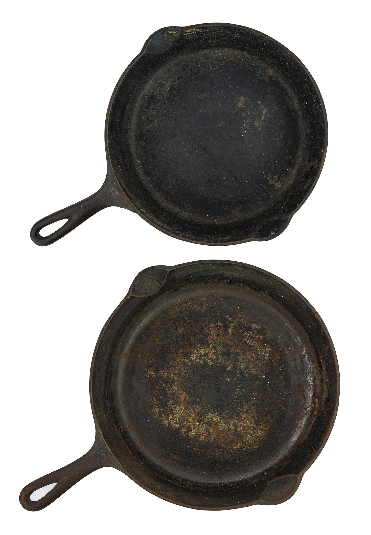 Two Griswold Large Block Skillets: Griswold #10 cast iron skillet, 716 A large block letters, fire ring, length 16 1/4", sold with a Griswold #8 cast iron skillet, 704 H, no fire ring, length 15 1/4"
