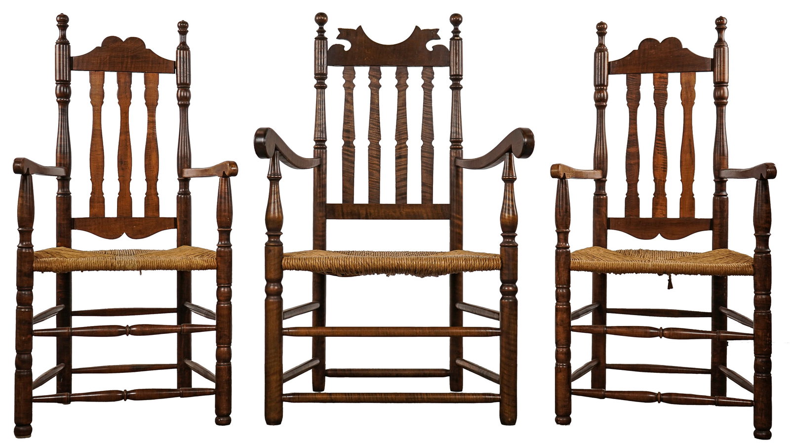 3 Bench Made Bannister Back Arm Chairs: 3 20th c tiger maple bannister back arm chairs. A pair with double tombstone crest, and a single great chair. Rush seats, good condition.