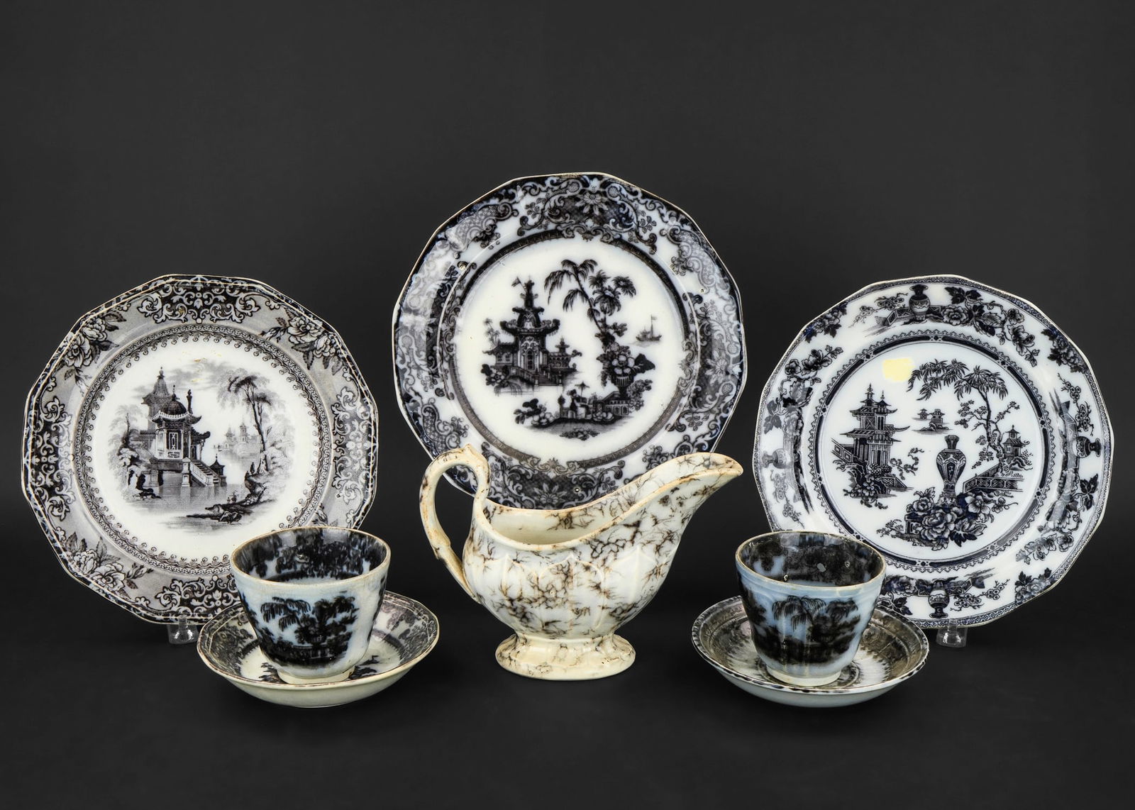 Collection of 52 pcs. 19th c. Mulberry Ironstone: Collection of 52 pcs. mid 19th c. cobalt mulberry transfer decorated ironstone tableware in various patterns to include Singan, Corean, Flora, Peru, Vincennes, Washington Urn, among others, pitcher, p