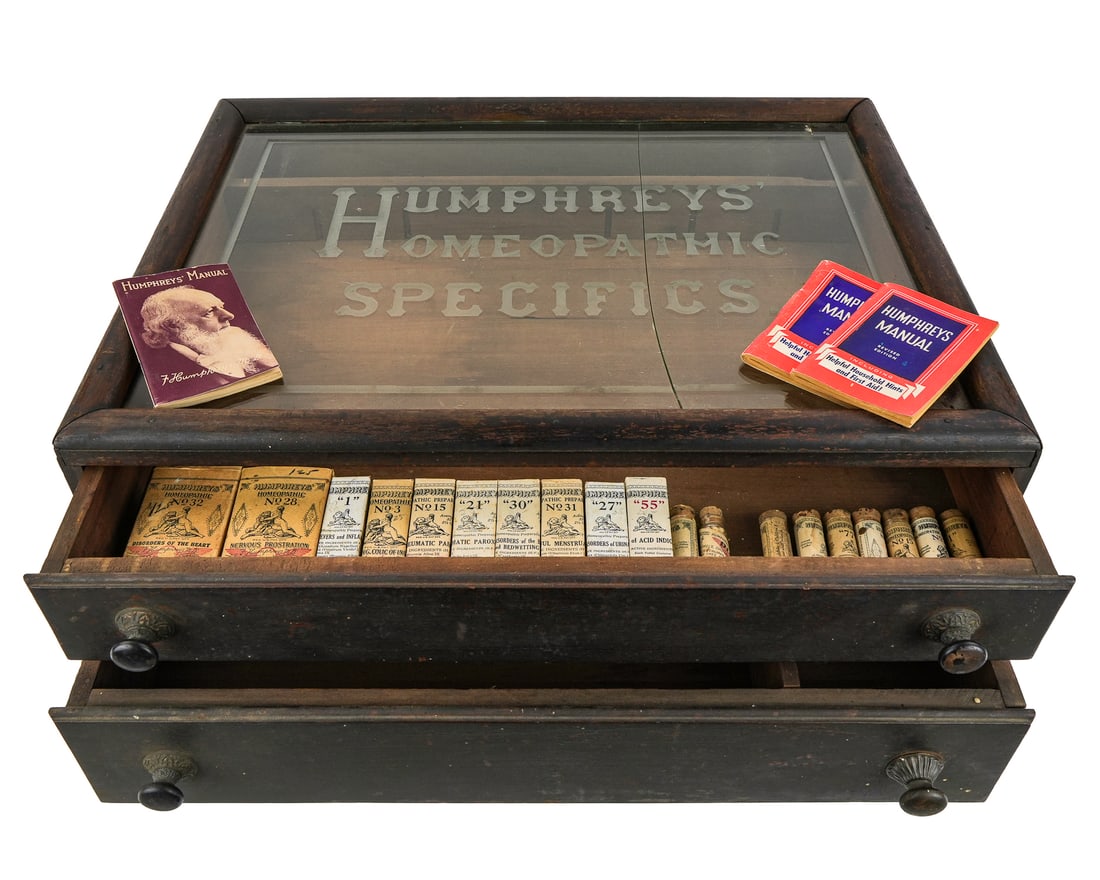 Humphrey's Specifics Countertop Display Case: Late 19th c. "Humphrey's Homeopathic Specifics" wooden 2 drawer drug store or apothecary countertop display case having etched advertising top panel, some original contents, top panel cracked, otherwi