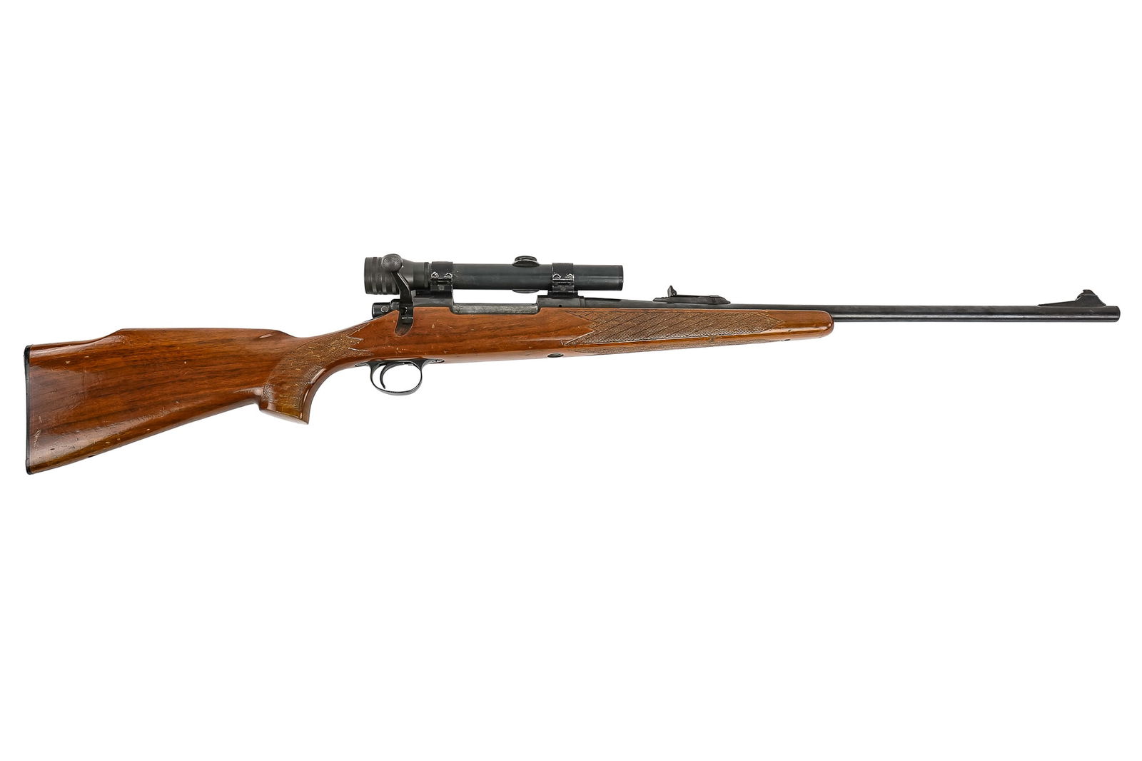 Remington Model 700 in .270 Winchester: Remington Model 700 Rifle in .270 Winchester minor field wear- Kollmorgen optical Bear Cub 2 3/4 x Scope Monte Carlo Stock - 21" barrel 42.5" overall -Firearms: All firearms are to be sold in accordan