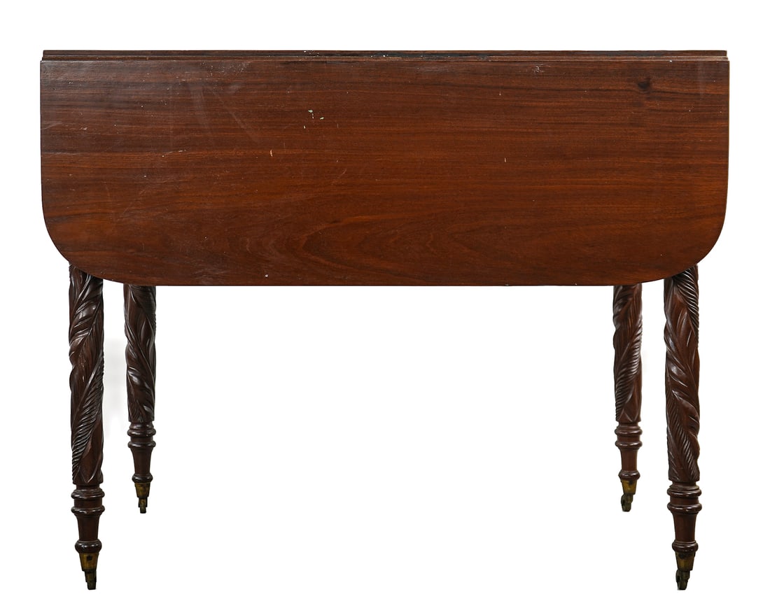 Sheraton Mahogany Acanthus Leg Pembroke Table: Fine 19thc American Sheraton mahogany Pembroke table with acanthus carved legs, castors, and period Sheraton hollow brass pull. 36" l, 29"h, 24"w with leaves down.