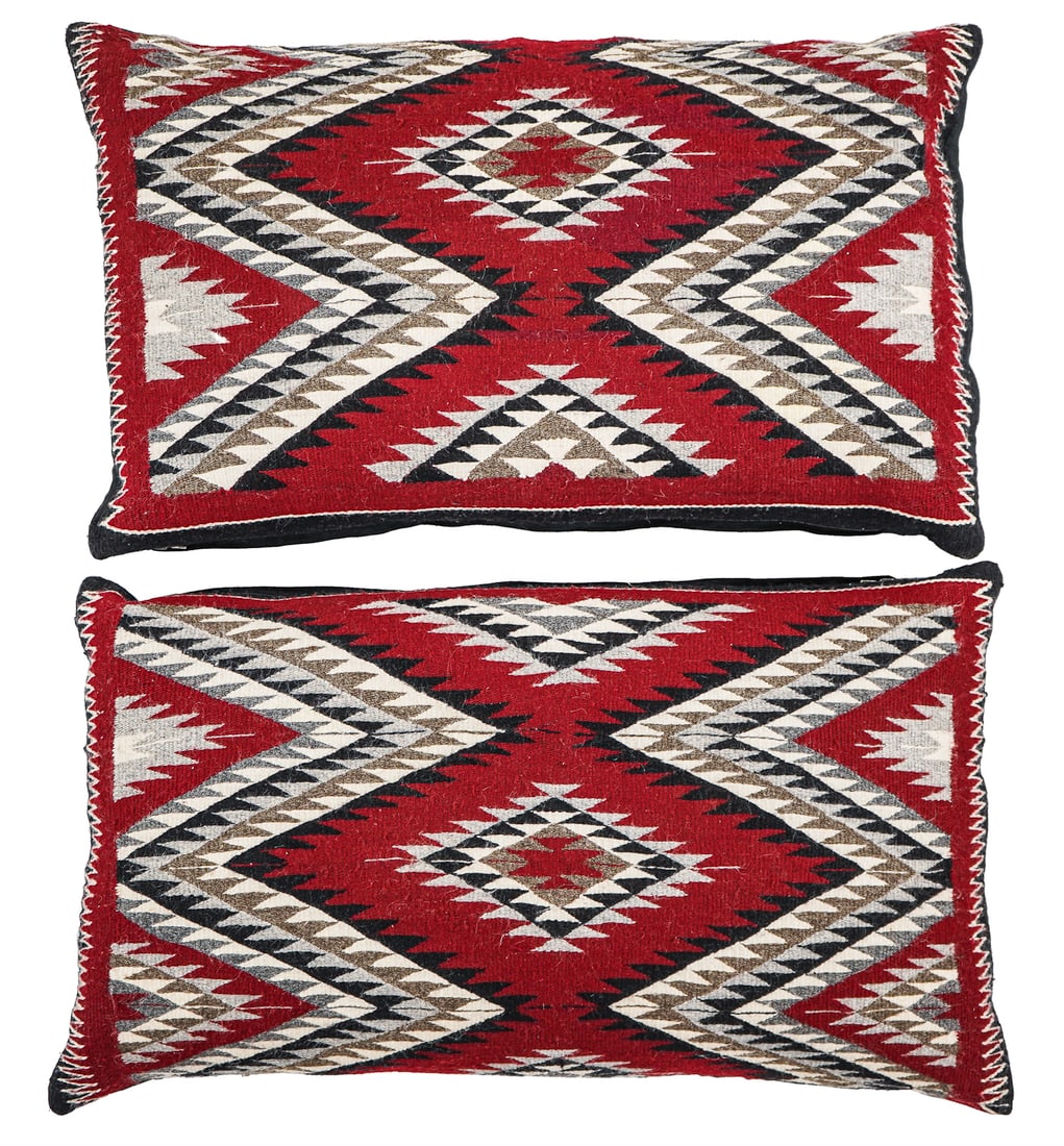 Two Navajo Textile Covered Pillows: Two contemporary Navajo Textiles made into pillows, may be possible to reverse the procedure, 28" x 16"