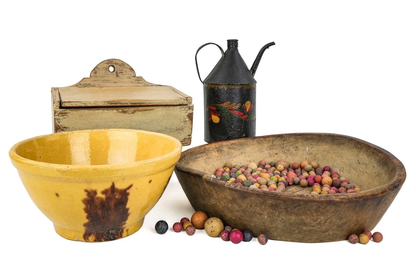 Yellowware, Tin, Wall Box, Clay Marbles: Yellowware bowl with brown manganese splotches (diameter 8"), painted toleware tin oil lamp filler (8 1/2"), early lift top candle wall box in old white paint(length 10") primitive wooden bowl (diamet