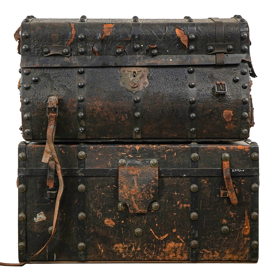 2 19th c. Brass Studded Leather Trunks: 2 mid 19th c. brass hobnail studded leather trunks, one domed having figural lion and serpent cast brass lock plate with calico cotton lined interior labeled "James R. Hill...Fancy Trunks...Concord, N