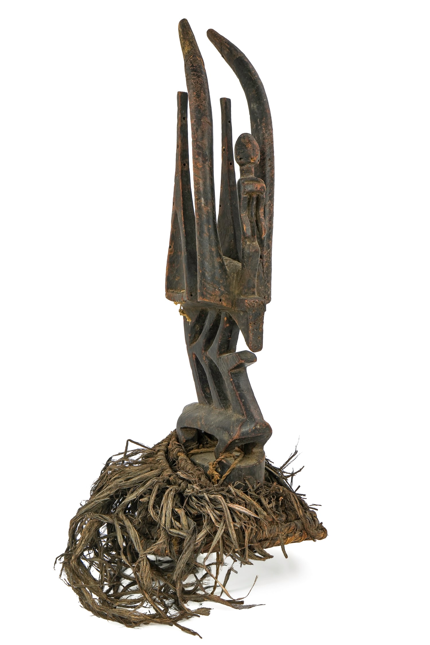 Bambara /Bamana People Mali Antelope Crest/ Head Dress: Bambara/ Bamana People Mali- Antelope headdress with woven basketry skull cap- central humanoid figure, drilled holes fro adornments- Crest is 18" high, 22" overall with skullcap - 9 " diameter -