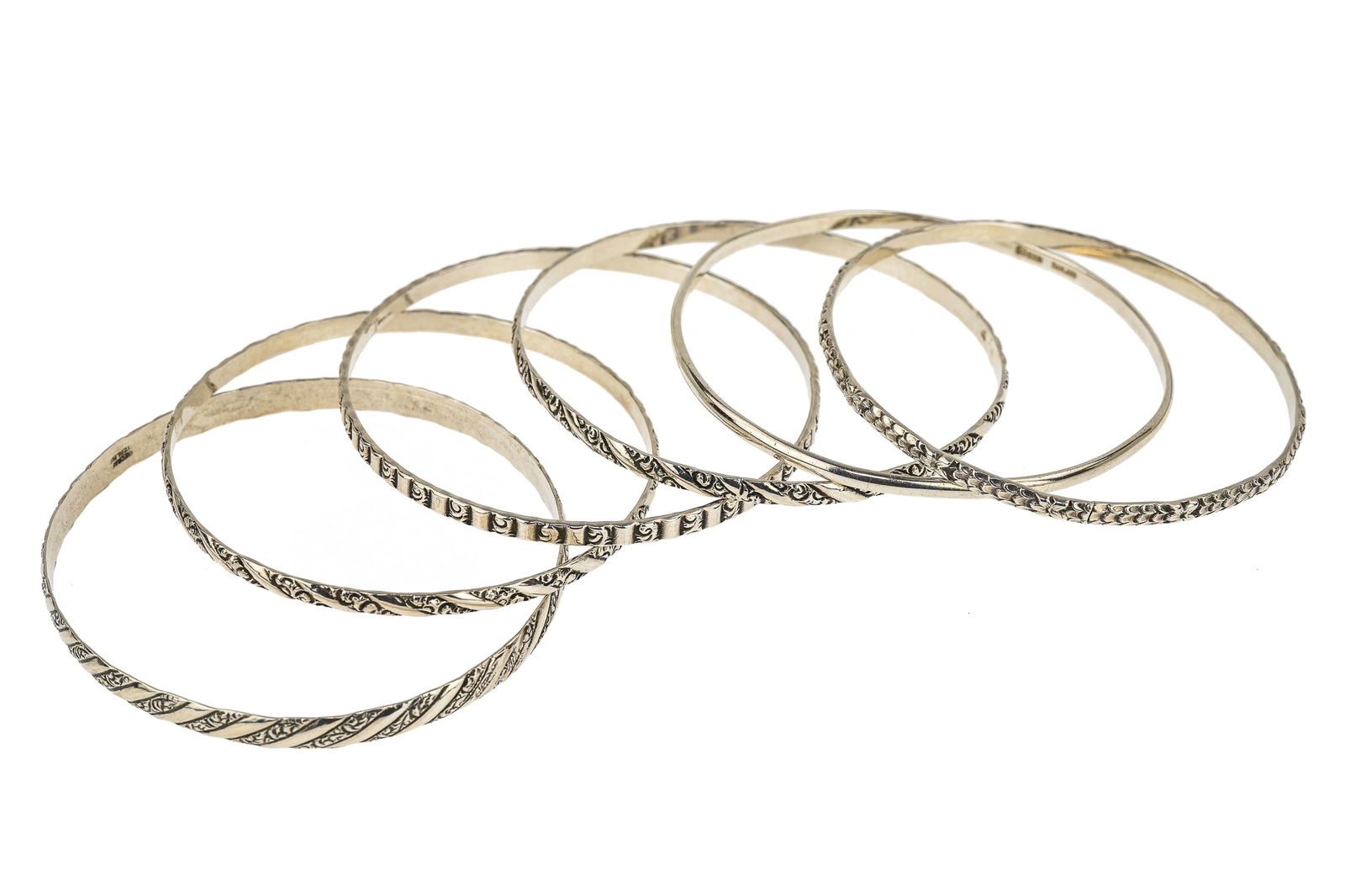 6 Sterling Bangles: 6 Sterling bangles. 2 5/8" diameter