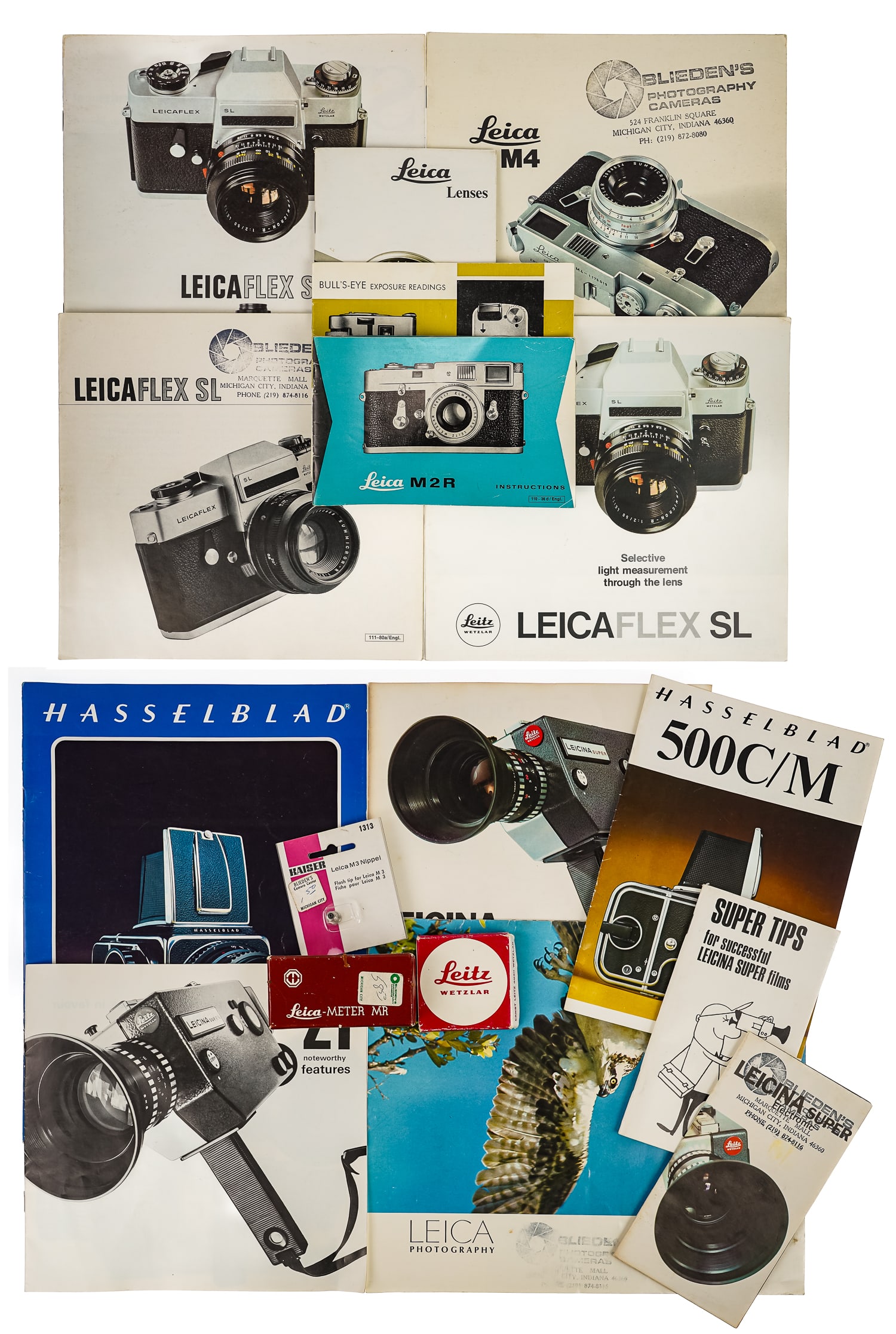Leica Pamphlets and Accessories: Leica pamphlets and accessories, including 10 pamphlets, 2 Hasselblad pamphlets, Leica M # nipple, Leica UVa filter