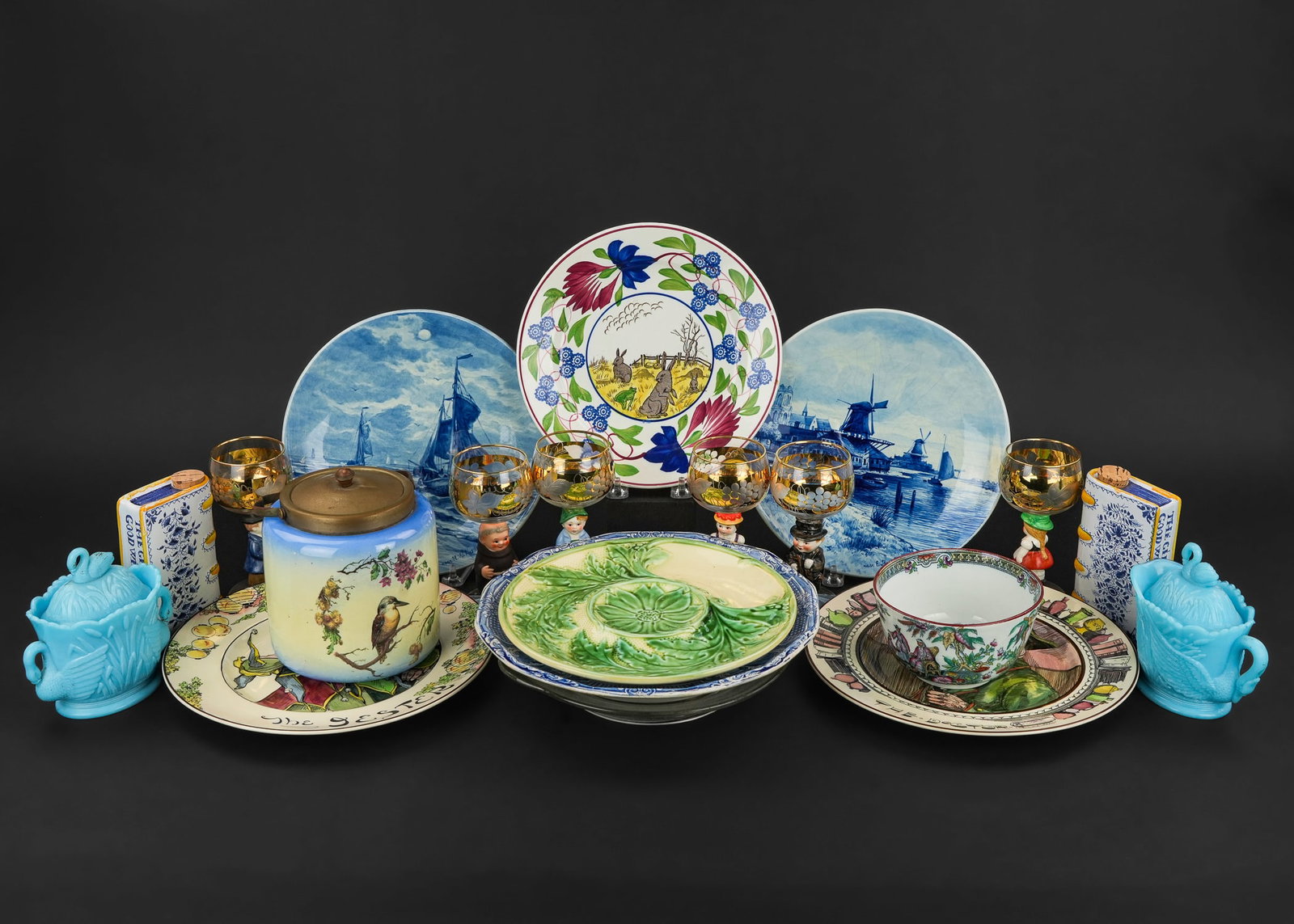 Glass and China incl. Royal Doulton, Goebel, etc: Estate lot of assorted glass and China including 6 Goebel wine goblets, pr. Royal Doulton "The Doctor" and "The Jester" portrait plates, pr. of Delft scenic plates, Westmoreland blue swan milk glass s