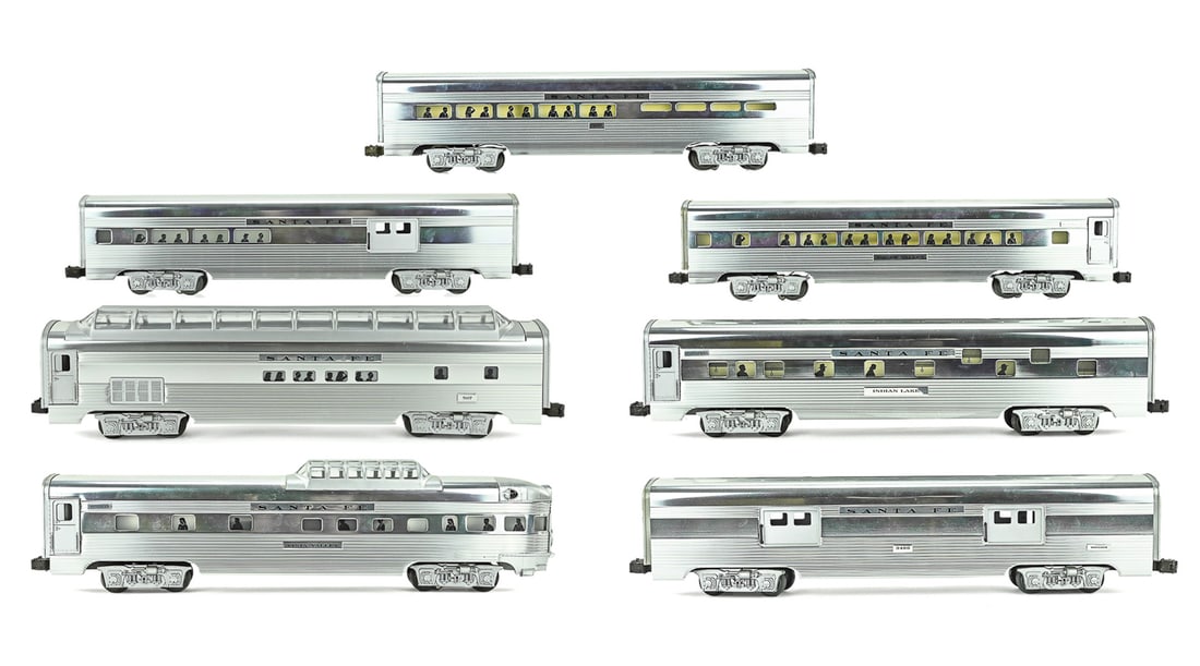 7 Lionel Santa Fe Aluminum Passenger Cars: 7 aluminum Santa Fe cars all O-scale in good condition some boxes show wear from being opened and have writing on them. Some cars have scuffs on the aluminum. SKU: 6-19113 "Vista Valley", 6-19112 "Squ