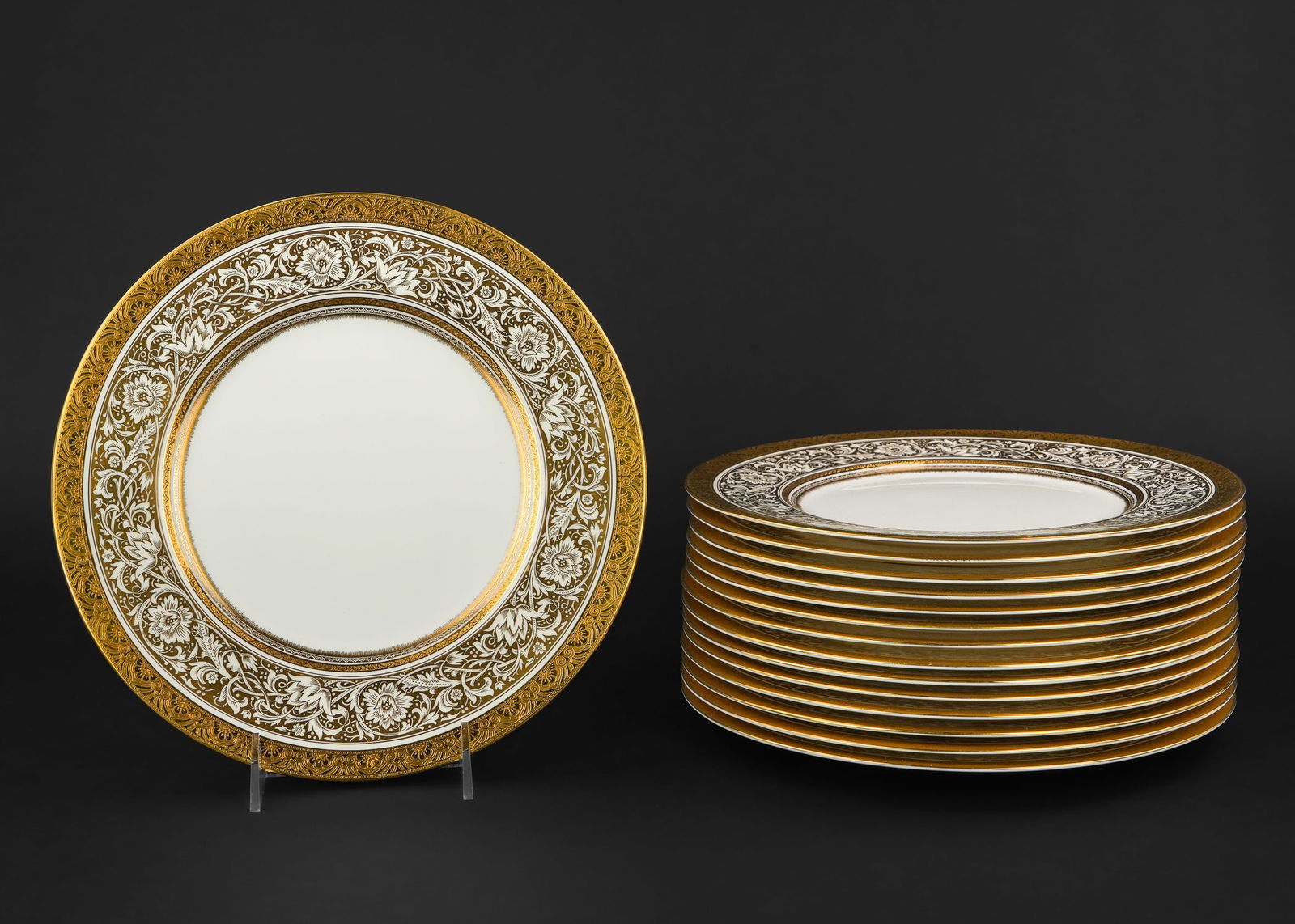 15 Minton Royal Ball Gilt Porcelain Dinner Plates: Set of 15 Minton "Royal Ball" English bone china porcelain dinner plates having elaborate gilt engraved bands and acanthus frieze, excellent overall condition dia. 10.75"