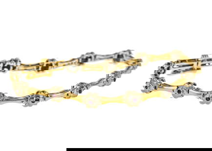 14k & Ruby Bar & Link Bracelet: 14k yellow gold bracelet having 12 bars & links each set with a .02 ct round cut ruby. 7" long. 12.6 grams t.w.