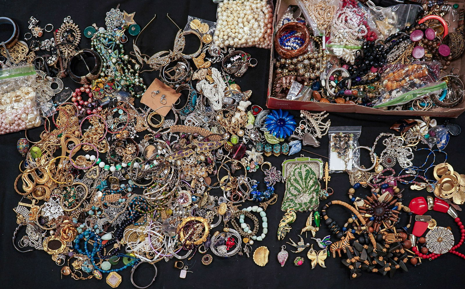 Outstanding Group of Costume Jewelry: Large collection of costume jewelry including Whiting Davis bag, many figural brooch pins, Trifari, Michal Golan, rhinestones, silver, and much more.