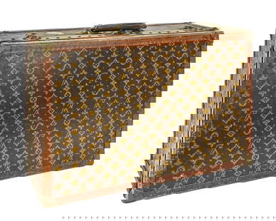 Louis Vuitton Monogram Suitcase, 23.5": Classic Louis Vuitton monogram canvas suitcase measuring 23.5" L x 15" W x 8.5" T. Features leather trim, brass hardware, and reinforced corners, with initials "N.R.C." monogrammed on one side. Shows
