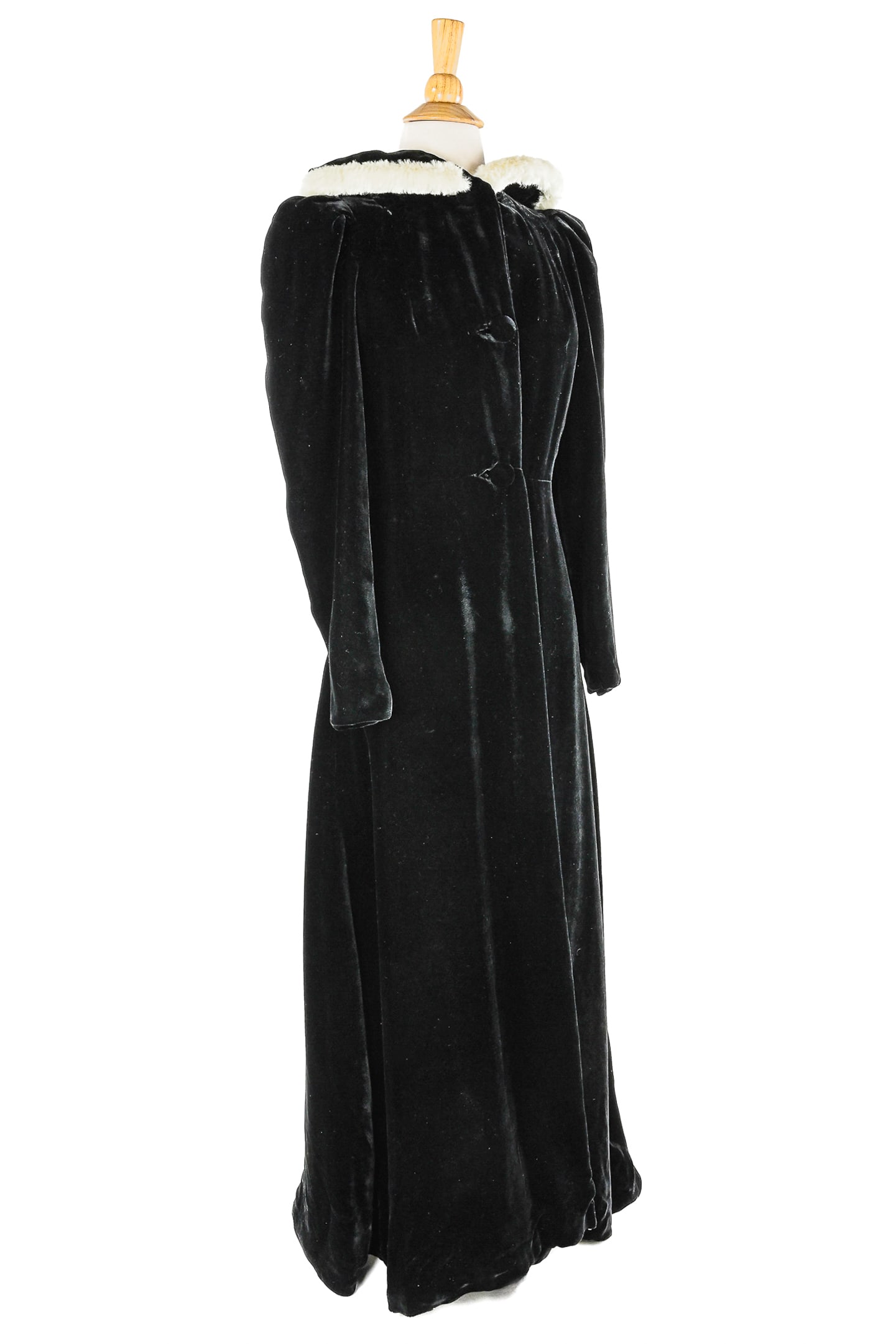 Mimi Shop Hooded Fur Gown: Mimi Shop full-length hooded fur gown, measuring approximately 55" long and 16" across the shoulders. The coat features a voluminous silhouette with an oversized hood, soft lining, and concealed faste