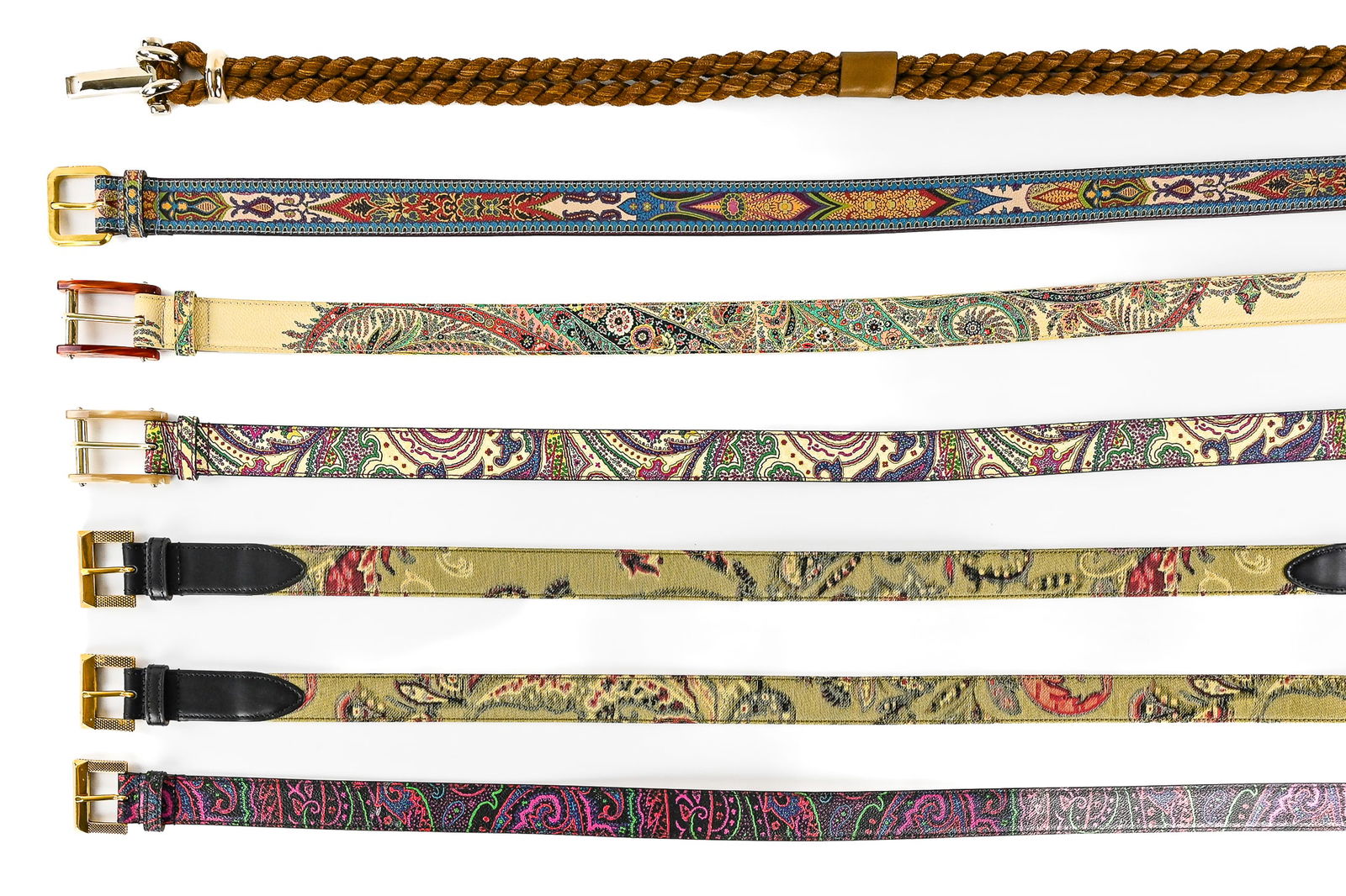 7 Etro Belts, Leather & Rope: Group of seven Etro belts in various styles and sizes, including six leather belts measuring 38", 36", 34" (x2), and 32" (x2), as well as one 32" woven rope belt. A stylish and versatile selection fro
