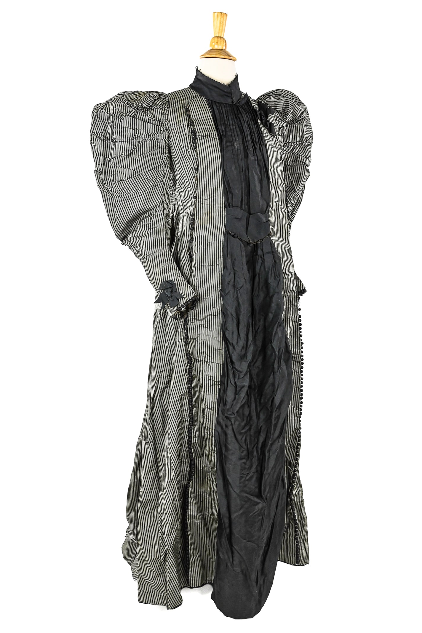 Ca. 1890 Mutton Sleeve Dress: Ca. 1890 black and grey stripe silk one piece dress. Mutton sleeves, center black panel. Ball detailing. Missing some balls, wear to collar, aged fabric.