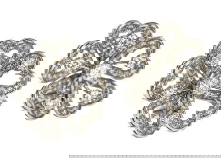 6 CT Mid Century Platinum & Diamond Earrings: Fine ca. 1940 platinum earrings set in a floral form having five heart shaped petals each with 14 .03 round cut diamonds in surround. Center with a .3 ct round cut diamond and 5 .1 ct round cut