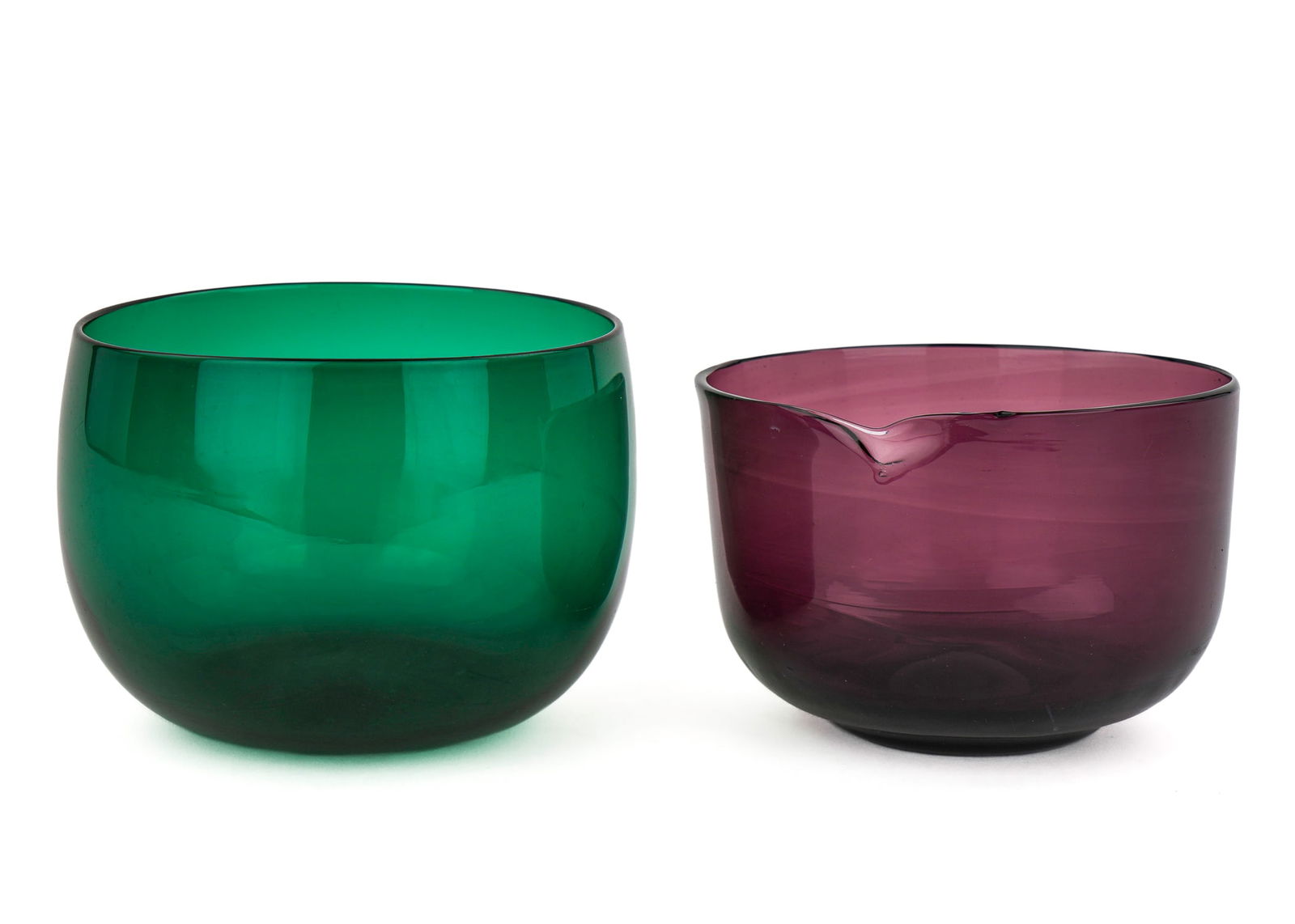 2 Early 19th c Blown Glass Bowls: 2 1st quarter 19th c blown glass bowls. One emerald with ground pontil, 4 3/4" diameter, 3 1/2" h. Second amethyst, ca. 1830, rough pontil, 4 3/4" diameter, 3" h, manufacturing flaw to rim.