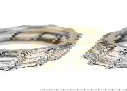 3 CT Platinum & Diamond Baguette Eternity Band: Platinum eternity band set with 12 baguette cut .25 ct diamonds. 3 CT.T.W. Diamonds. Ring size 5.5. VS1, G color.