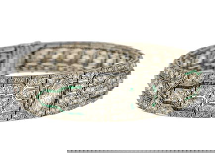 12 CT Art Deco Diamond, Emerald & Platinum Bracelet: Fine period Art Deco platinum, emerald, & diamond bracelet. Featuring a center marquise cut diamond measuring 11.5 mm x 5.2 mm x 3.5 mm, 1.2 CT. VS1, J. Accented with 20 European round cut diamonds .3