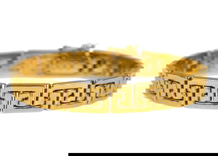14k Yellow Gold Bracket: Fine 14k yellow gold Italy Milor bracelet. 8 mm wide. 7 1/8" long. 16.2 grams t.w.