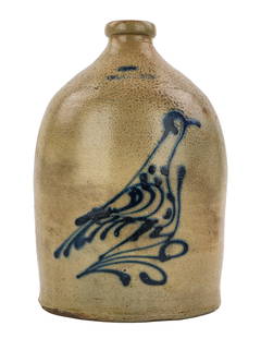 J B Lewis & Co Bird Decorated Jug: Signed "From J B. Lewis & Co" 1 gallon bird decorated stoneware jug, check and chip where handle meets spout, otherwise very good condition, ht 11"