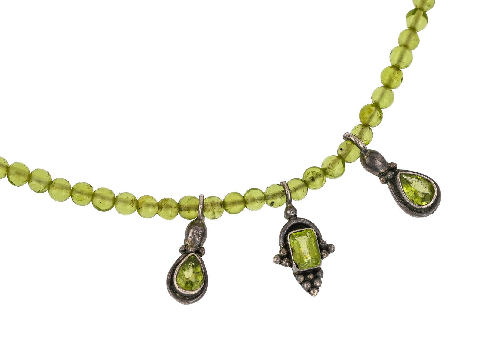 Green Peridot & Silver Necklace: 3 mm bead green peridot necklace set with 3 silver drops with center green peridot. 15" long.