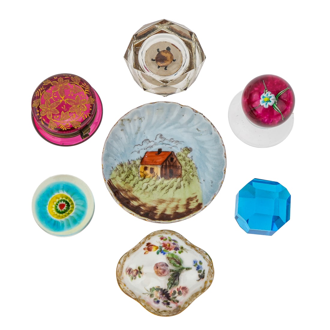 Art Glass Paperweights and Miniatures: Group of art glass paperweights and miniatures, including blown floral footed miniature paperweight, turtle under glass cut faceted paperweight, small Dresden covered dish, cranberry glass pill box, e