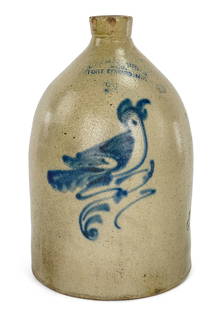 Ottman Bros Fort Edward Bird Decorated Jug: Ottman Bros & Co, Fort Edward, NY 2 gallon bird decorated stoneware jug, several chips on spout, stone bursts at waist, ht 14"