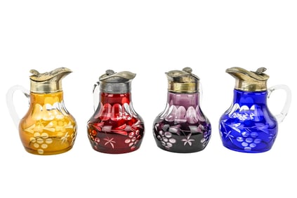 4 Cut Glass Syrup Pitchers in Amethyst, Amber, Cranberry, and Cobal