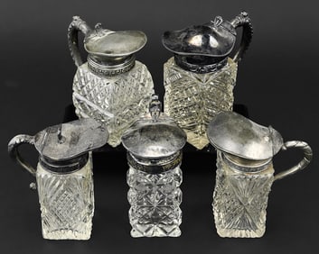 Five Victorian Cut Glass Syrup Pitchers with Silver Plated and Pewter Lids