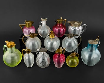 13 Pressed Art Glass Syrup Pitchers