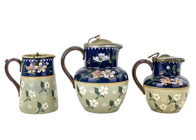 Three Langley Ware Daisy Jugs and Syrup Pitchers