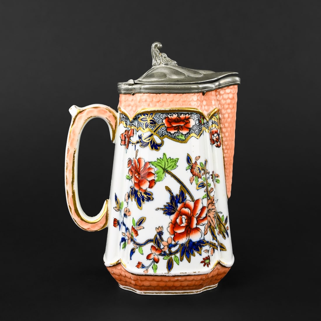 Minton Imari-Style Syrup Pitcher: Imari ware syrup pitcher in the Japanese style, featuring traditional cobalt blue, iron red, and gilt accents. Stamped both Minton and Spode Copeland. Measures approximately 5" tall x 3" wide.