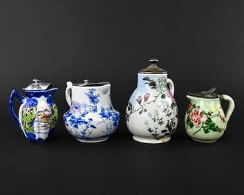 4 Porcelain Syrup Pitchers with Asian Motifs