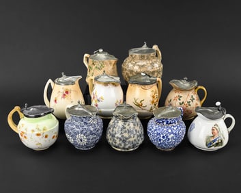 7 Silver Plate Syrup Pitchers