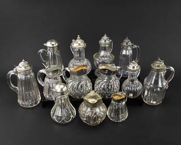13 Victorian Molded Glass Syrup Pitchers