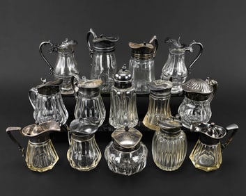 14 Cut Glass Syrup Pitchers