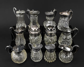 12 Silver Plate & Cut Glass Syrup Pitchers