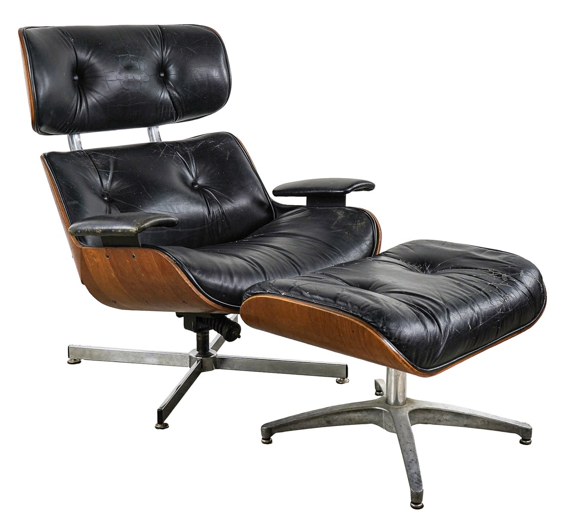 Circa 1970 Eames Leather Lounge: Circa 1970 Plycraft Eames Black leather lounge with 4 leg base and ottoman in lived in honest wear condition, one repaired crack in leather.